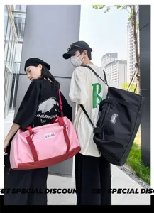 Large capacity travel duffel bag for sports, gym, and yoga with lightweight design.
