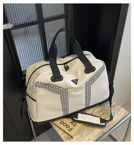 Large capacity travel duffel bag for gym, yoga, and short trips with wet dry separation.