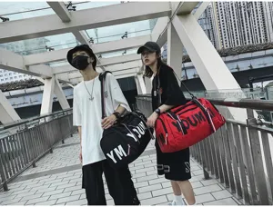 Large capacity sports gym bag with shoe compartment and wet dry separation for travel and fitness.