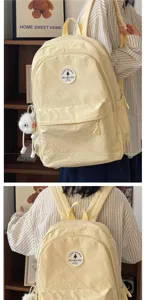 Großer lässiger Schulrucksack für Studenten, stilvolle Canvas Schultasche mit süßem Plüschanhänger.
