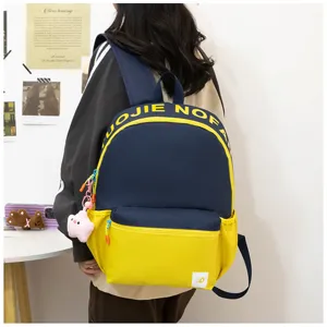 Japanischer farbblockierter lässiger Rucksack für Studenten, große Kapazität modische Schultasche.