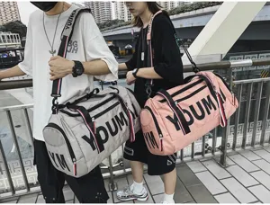 Detailed view of large capacity sports duffel bag, waterproof fitness travel bag with shoe compartment.