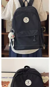 Großer minimalistischer schwarzer Schulrucksack für Studenten, stylische Laptop-Reisetasche.