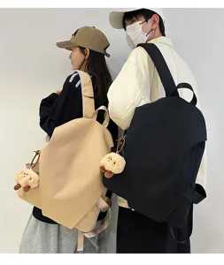 Zaino impermeabile minimalista e alla moda per uomo e donna, borsa da viaggio elegante.