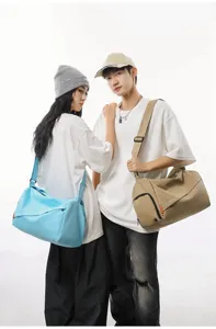 Stylish sports duffel bag detail showcasing dry-wet separation and lightweight travel design.