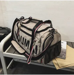 Large capacity sports gym duffel bag with shoe compartment for travel and fitness use