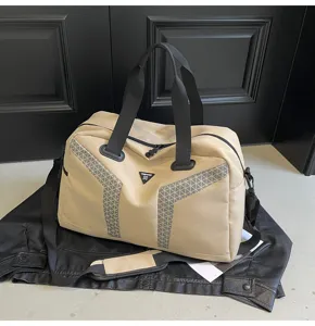 Large capacity travel duffel bag stylish gym shoulder bag with geometric reflective details.