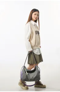 Fashionable grey yoga gym shoulder bag with purple straps and spacious capacity for daily use.