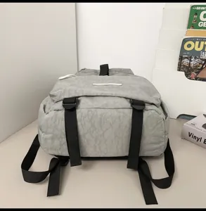 Lightweight casual travel backpack with large capacity for outdoor and daily use, grey.