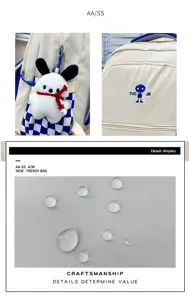 Zaino scolare a contrasto elegante con ciondolo in peluche carino e tessuto impermeabile.