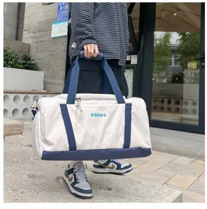 Large capacity travel duffel bag with dry wet separation for sports and fitness daily use.