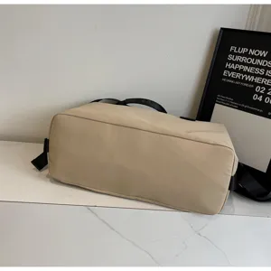 Large capacity casual minimalist travel duffel bag with handles and shoulder strap for fitness.