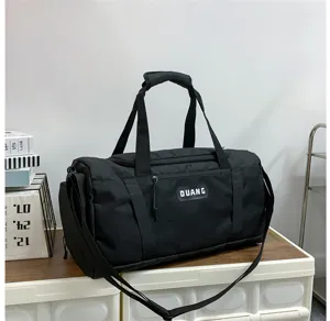 Black large capacity sports travel bag with dry wet separation, detail view of the body.