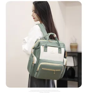 Mochila cambiador multifuncional de gran capacidad con correas cómodas y varios bolsillos.