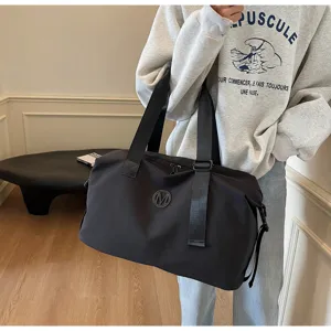 Large capacity black travel duffel bag minimalist fitness yoga luggage bag with handles.