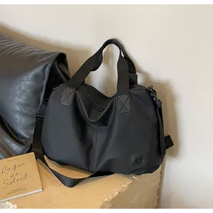 Casual black nylon travel tote bag, large capacity single shoulder bag for daily commute.