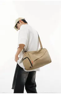 Men's casual crossbody sports fitness bag, lightweight waterproof travel duffel bag for daily use.