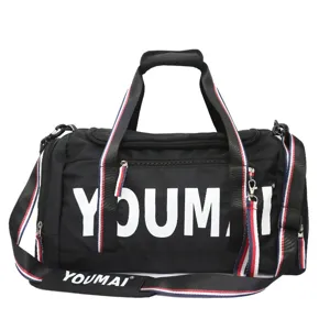 Large capacity black gym duffel bag with shoulder strap and stylish red white blue webbing.