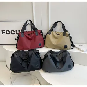 Casual large capacity nylon tote bag for women, multi-color travel commuter shoulder bag.