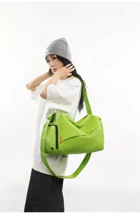 Lightweight green sports gym duffel bag for women and men, ideal for travel, swimming, and fitness.