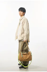 Men's large capacity fitness travel shoulder bag with trendy color-blocking straps.