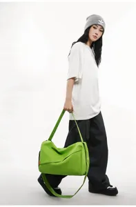 Green crossbody gym bag, lightweight splash-proof travel shoulder bag for sports and daily use.