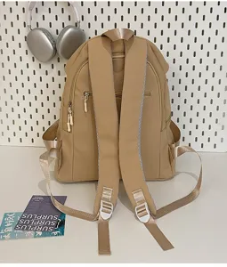 Zaino casual impermeabile beige minimalista borsa da scuola per viaggi donna e uomo alla moda