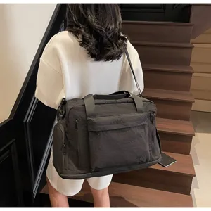 Large capacity travel duffel bag minimalist waterproof sports gym bag for fitness and business trips.