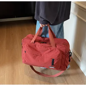 Large capacity gym travel bag detail view, dry wet separation sports duffel handbag for fitness.