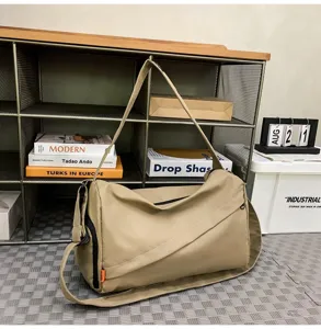 Khaki sports gym bag for women and men, lightweight waterproof travel crossbody bag for swimming.