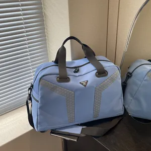 Large capacity blue travel duffel bag with handles for gym, yoga, and short business trips.