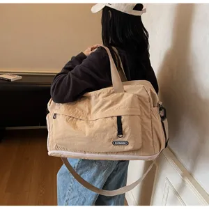 Large capacity travel gym bag with dry wet separation, stylish shoulder sports handbag for women.