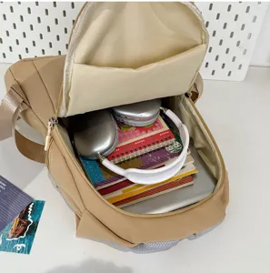 Zaino da viaggio impermeabile, elegante zainetto scolastico per studenti con grande capienza.