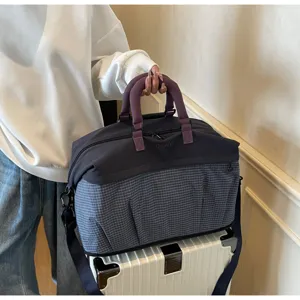 Large capacity travel duffel bag lightweight luggage handbag for short business trips and sports.