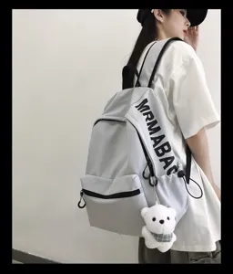 Minimalist casual school backpack for women solid color stylish student campus bag style