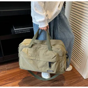 Large capacity travel duffel bag for gym, fitness, sports and outdoor weekend trips.