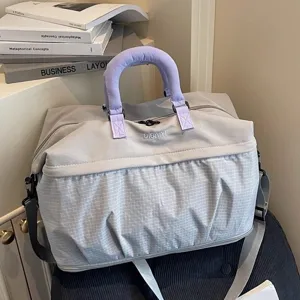 Large capacity travel duffel bag for short trips, gym, and lightweight storage with shoulder strap.