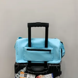 Lightweight travel duffel bag waterproof gym bag with trolley sleeve for short trips blue