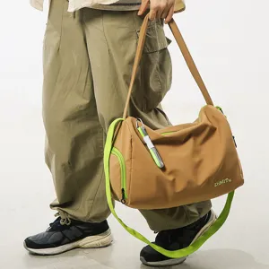 Stylish color-block fitness travel bag, lightweight large-capacity gym shoulder crossbody for men.