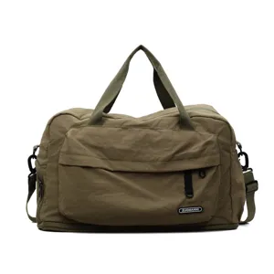 Large capacity military green travel duffel bag with wet dry separation and shoulder strap.