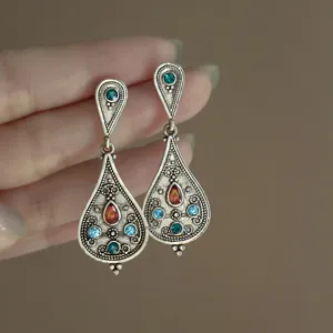 Vintage bohemian style teardrop rhinestone earrings, antique silver finish, ethnic chic jewelry.