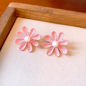 Pink flower stud earrings with white pearl center, sweet girlish style, cute everyday jewelry.