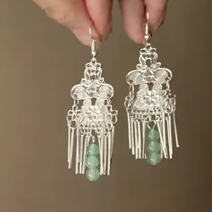 New Chinese ethnic style flower beaded tassel earrings, retro silver metal and green bead design.