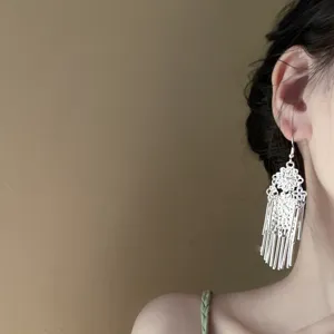 New Chinese vintage silver flower tassel earrings, bohemian ethnic style detail shot.