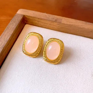 Vintage oval pink stone gold earrings, elegant retro design, perfect daily chic jewelry accessory.