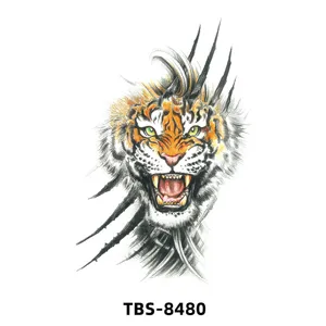 Autocollant de tatouage temporaire avec un motif abstrait de visage de tigre rugissant.