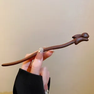 Wooden hair stick with cute rabbit carving detail, retro neo-Chinese hair accessory for women.