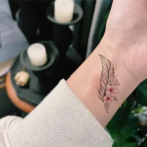 Fresh floral and feather temporary tattoo sticker for chic and beautiful wrist body art wear.