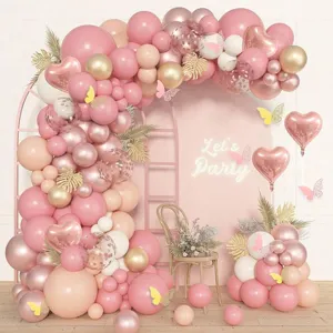 Pink gold balloon arch kit with butterflies for birthday party background decoration.
