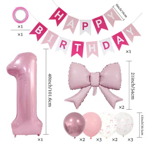 Kit ballon anniversaire nœud rose avec ballon aluminium chiffre 1, bannière et ballons imprimés.